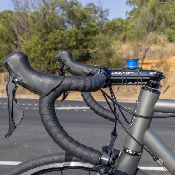 התקן מעמד לטלפון עם חיבור לסטם Quad Lock Stam Mount